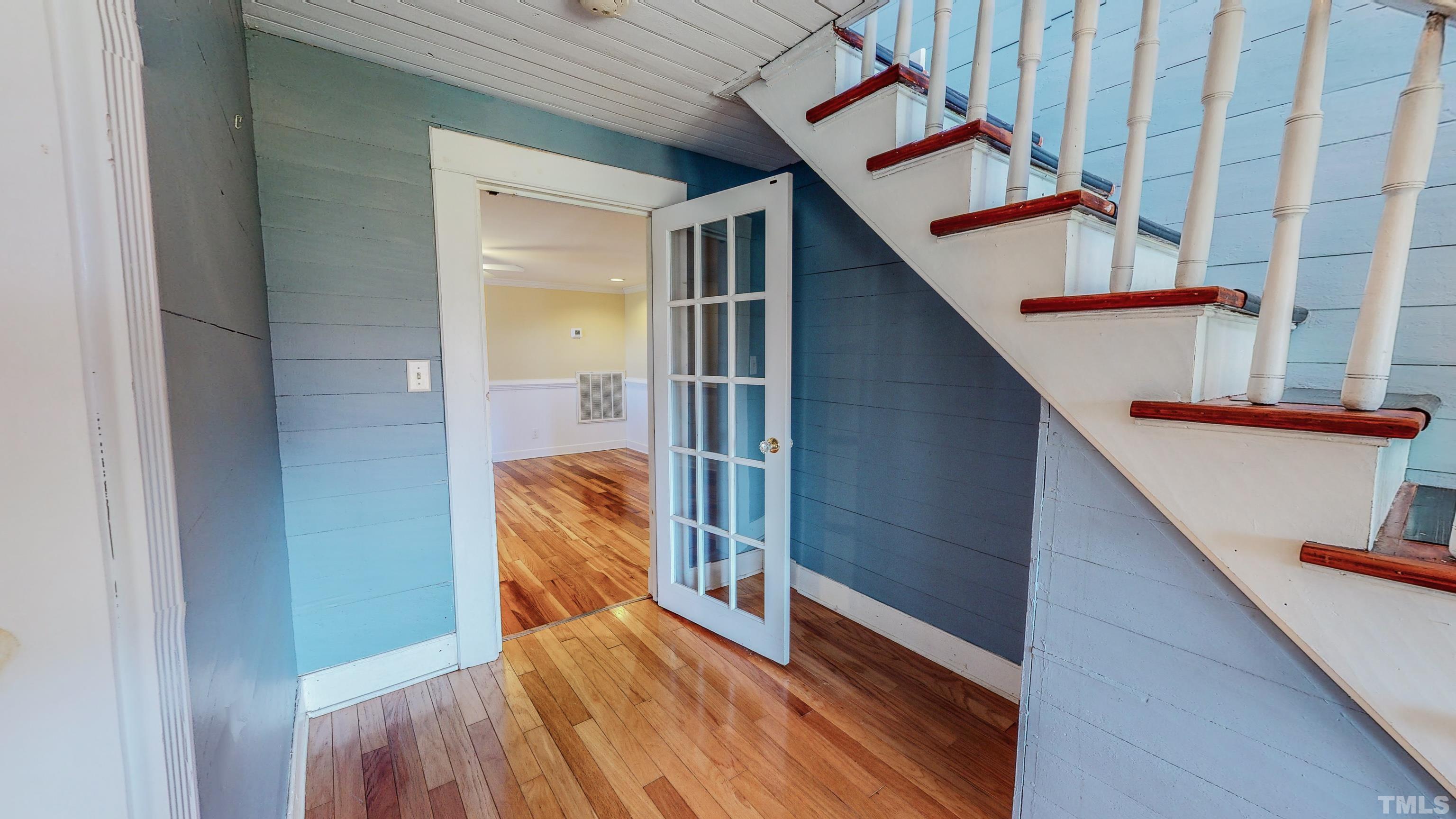 7435 Helena Moriah Road Rougemont, NC 27572 - Photo 19 of 58 a view of balcony with wooden floor and stairs