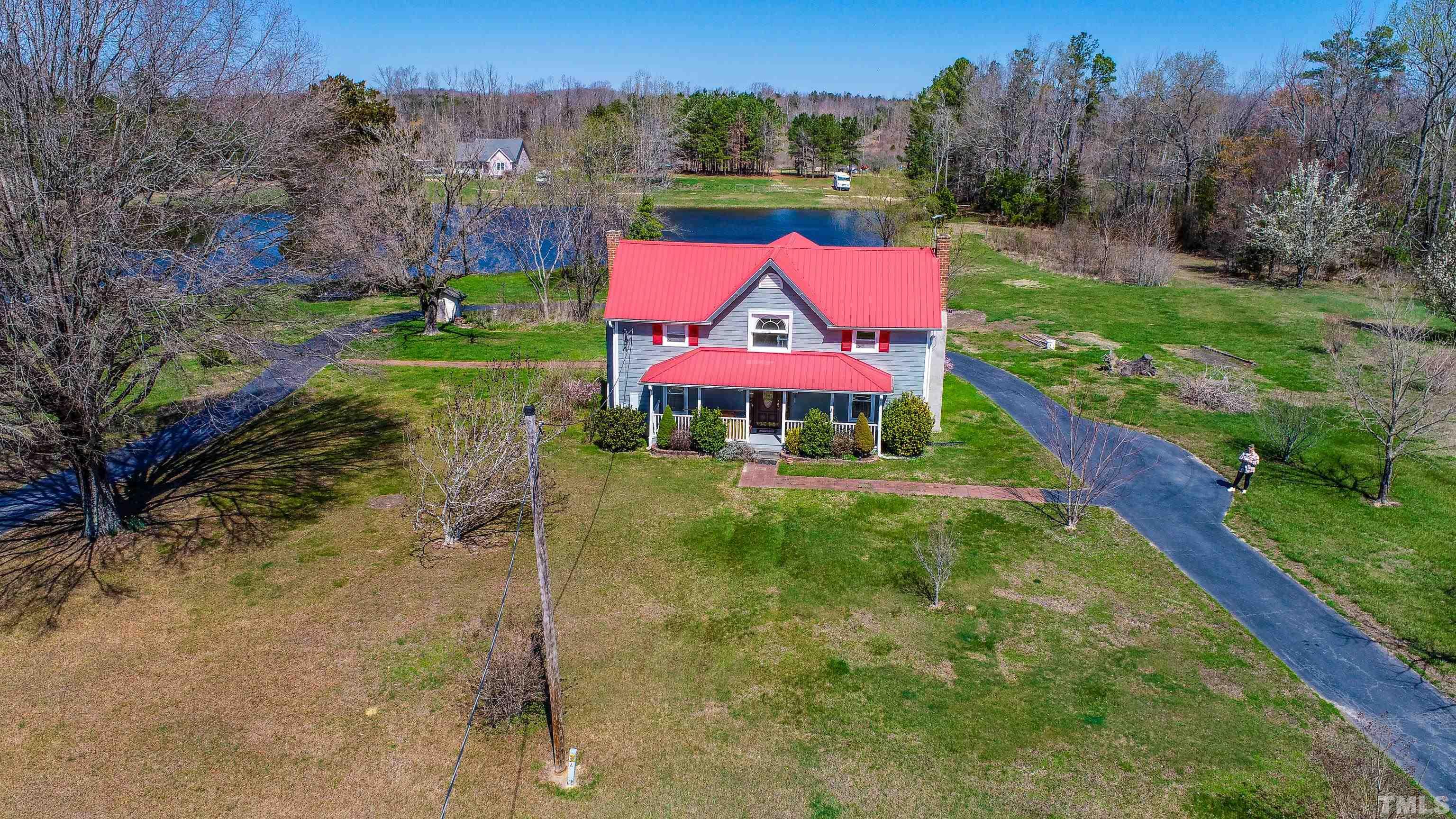 7435 Helena Moriah Road Rougemont, NC 27572 - Photo 54 of 58 a view of backyard with swimming pool and outdoor seating