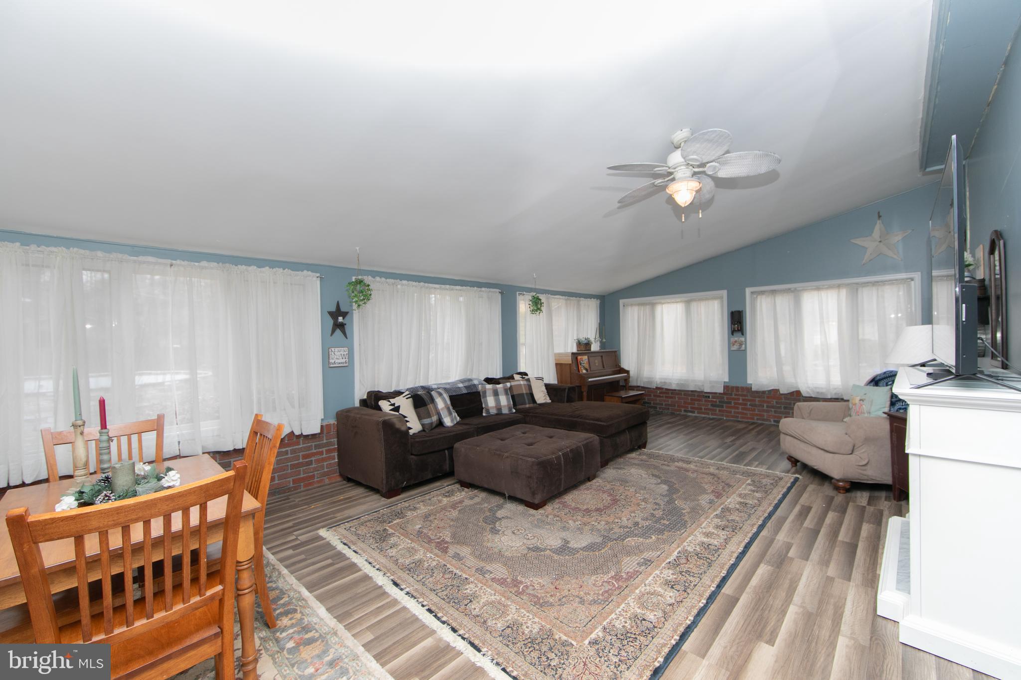 454 Pricketts Mill Road Tabernacle, NJ 08088 - Photo 19 of 49 a spacious bedroom with a bed a couch and dresser