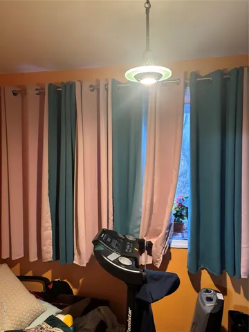 a room with furniture and window