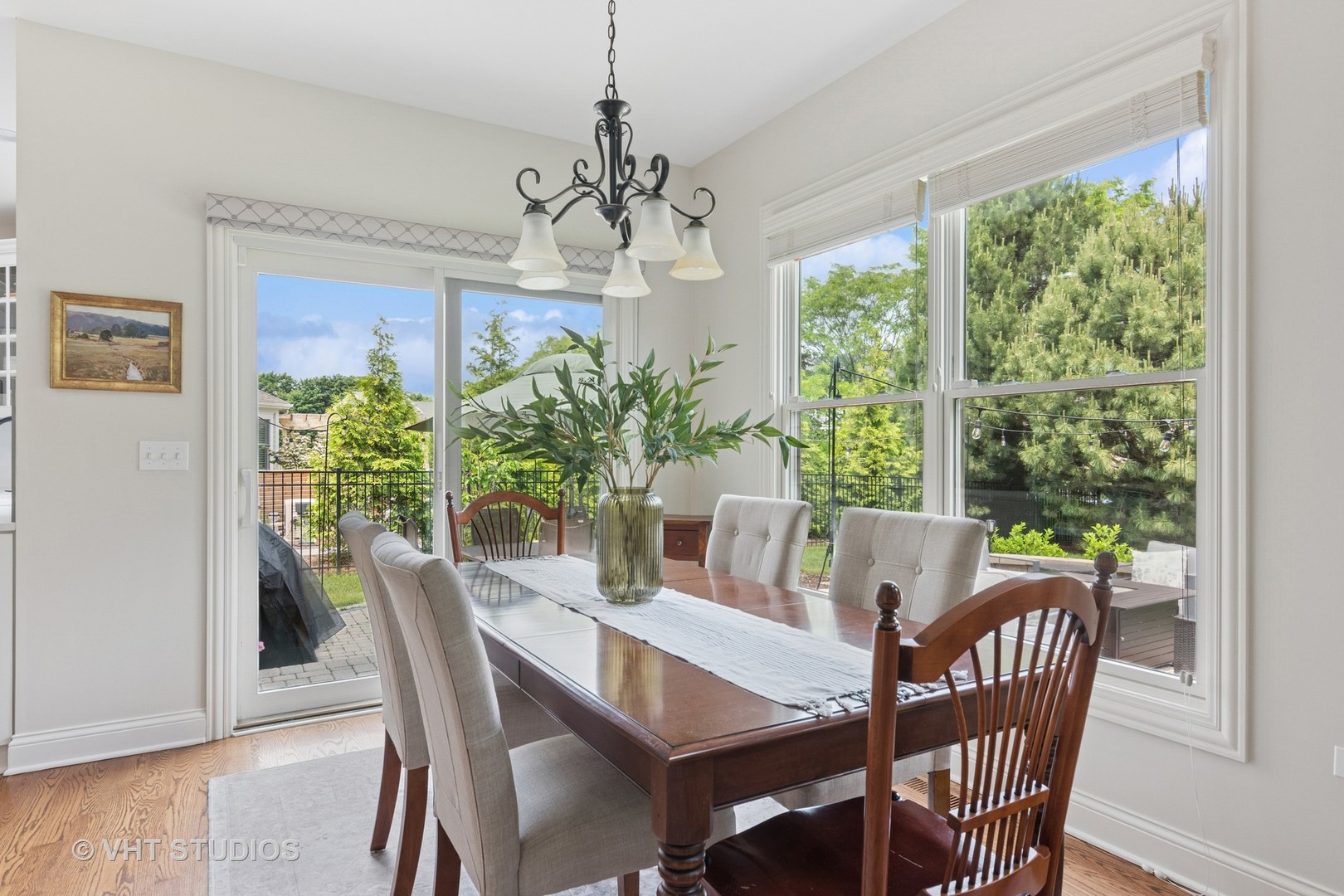 76 Landon Circle Wheaton, IL 60189 - Photo 13 of 51 a view of a dining room with furniture window and wooden floor
