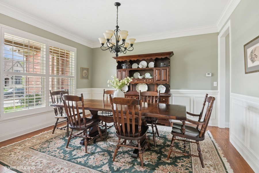 76 Landon Circle Wheaton, IL 60189 - Photo 14 of 51 a view of a dining room with furniture window and outside view