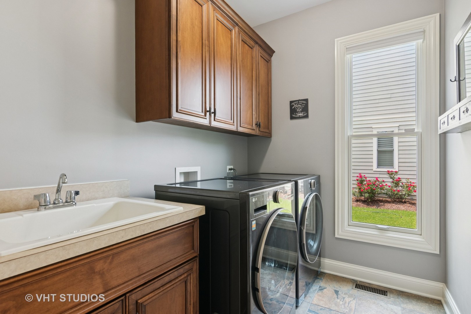 76 Landon Circle Wheaton, IL 60189 - Photo 19 of 51 a utility room with dryer and washer