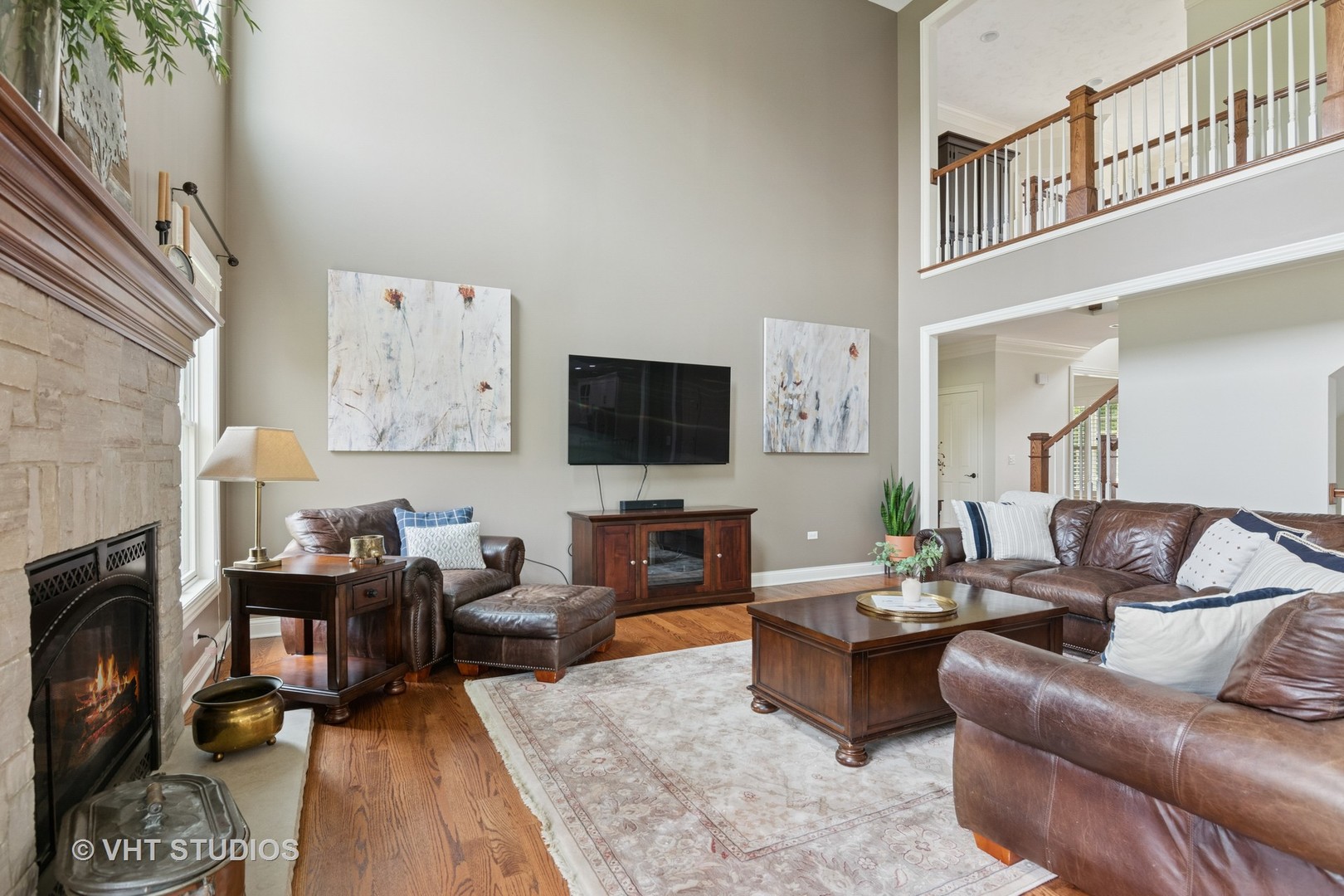 76 Landon Circle Wheaton, IL 60189 - Photo 4 of 51 a living room with furniture and a flat screen tv