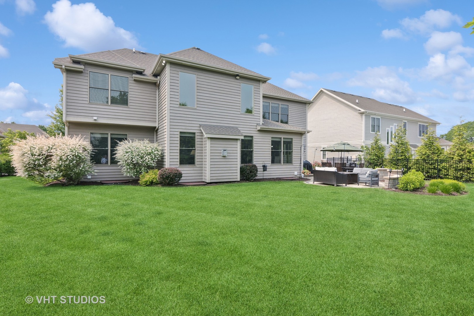 76 Landon Circle Wheaton, IL 60189 - Photo 44 of 51 a front view of house with yard and green space