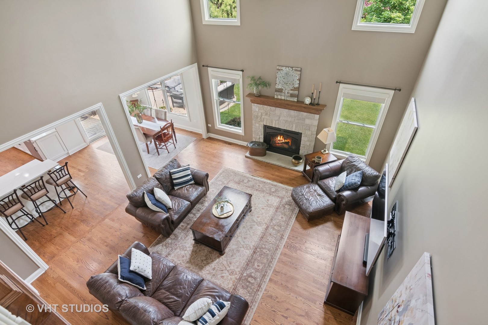 76 Landon Circle Wheaton, IL 60189 - Photo 6 of 51 a living room with furniture and a fireplace