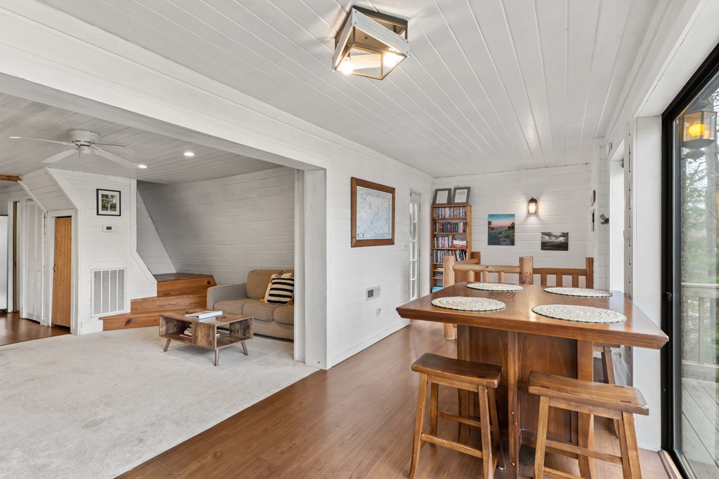 115 Barnhill Road Blairsville, GA 30512 - Photo 15 of 65 a living room with furniture and a wooden floor
