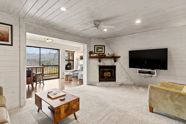 a kitchen with stainless steel appliances granite countertop a stove and a refrigerator