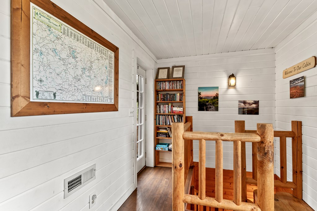 115 Barnhill Road Blairsville, GA 30512 - Photo 3 of 65 a view of a livingroom with wooden furniture and staircase