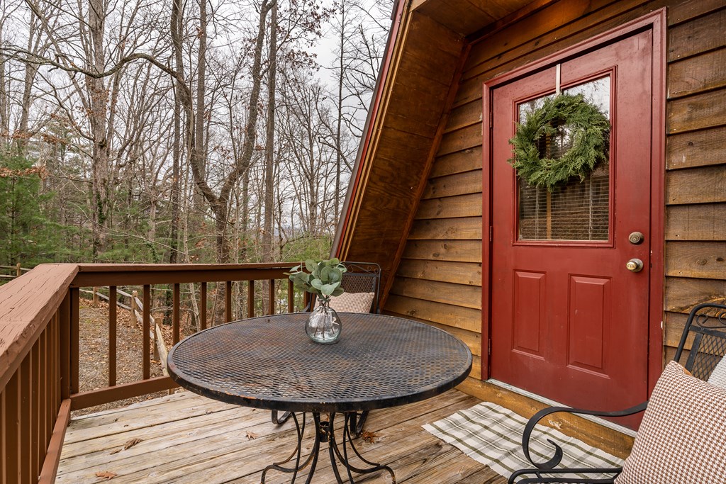 115 Barnhill Road Blairsville, GA 30512 - Photo 32 of 65 a view of balcony with furniture and wooden deck