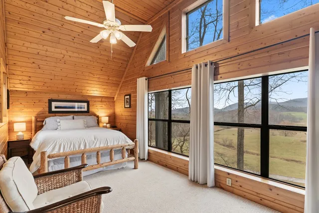 a view of balcony with wooden floor and outdoor seating