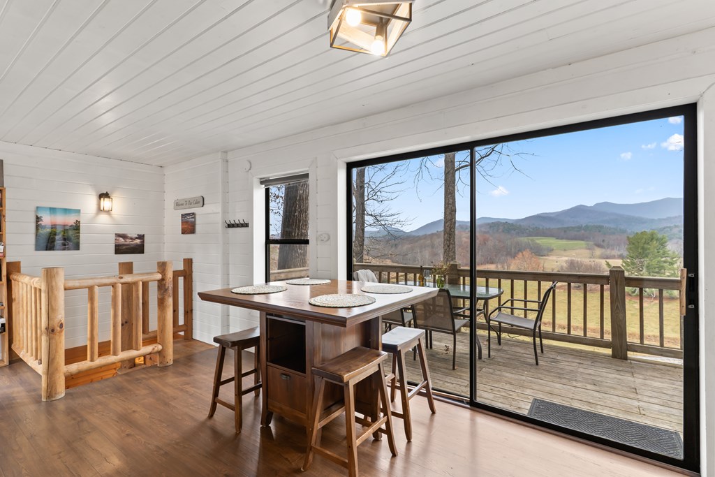 115 Barnhill Road Blairsville, GA 30512 - Photo 4 of 65 a view of a dining room with furniture window and wooden floor