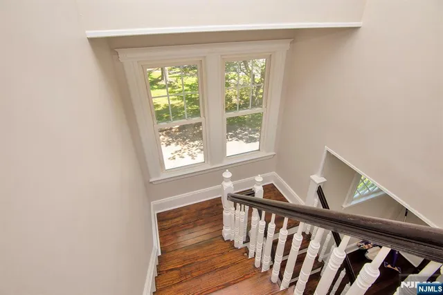 a view of entryway with wooden floor