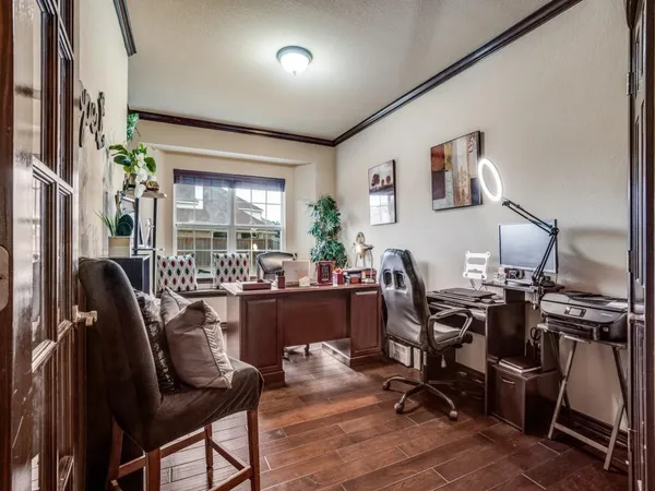 a view of a workspace and dining room