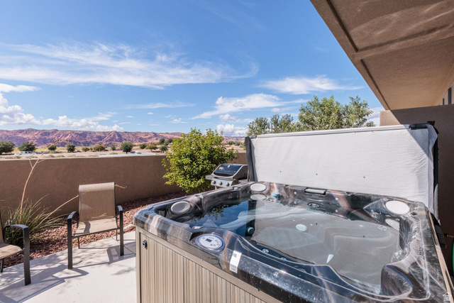 4845 Fishers Is Way St. George, UT 84770 - Photo 2 of 41 View of patio featuring a mountain view and a hot tub