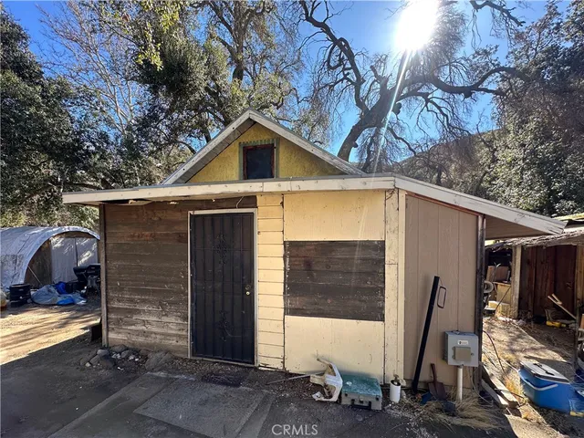 a view of mountain and tree in the background