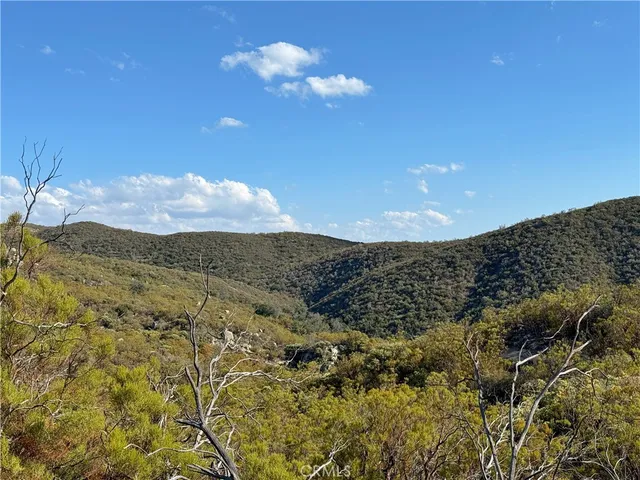 a view of a house with a mountain