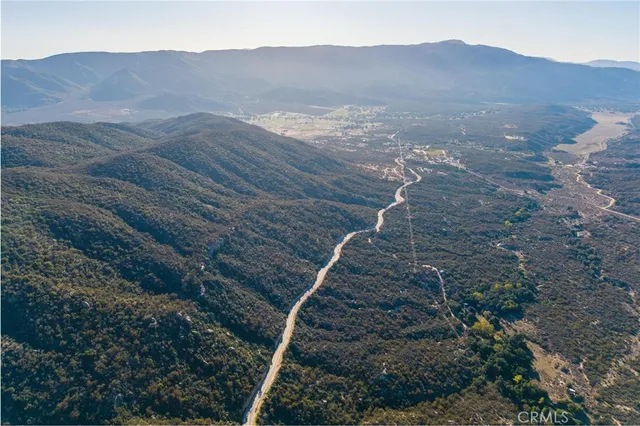 a view of mountains and valleys