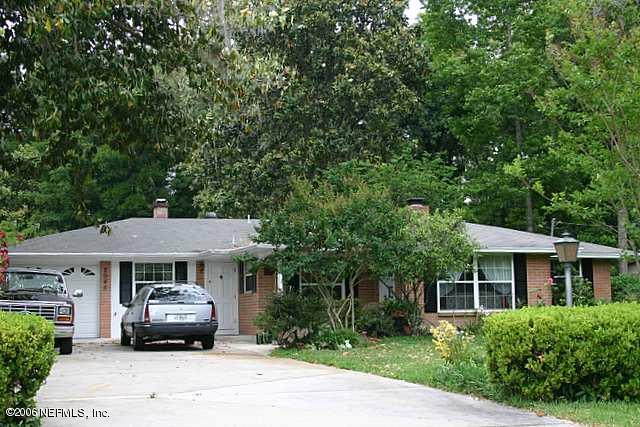 2945 Holly Road Orange Park, FL 32065 - Photo 1 of 5 a car parked in front of a house