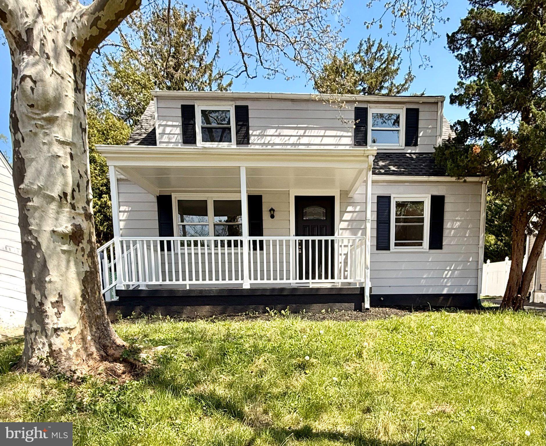 Charming home with inviting porch.