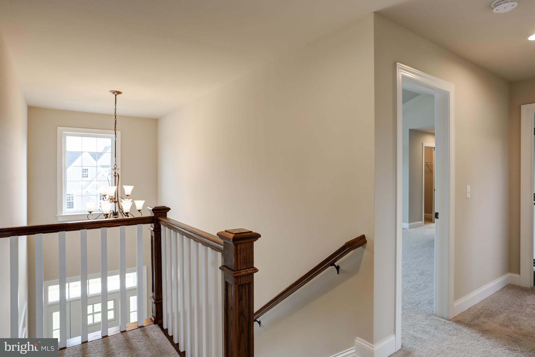 1021 Suffolk Drive, Unit 7 Lititz, PA 17543 - Photo 26 of 46 Stair area overlooks foyer