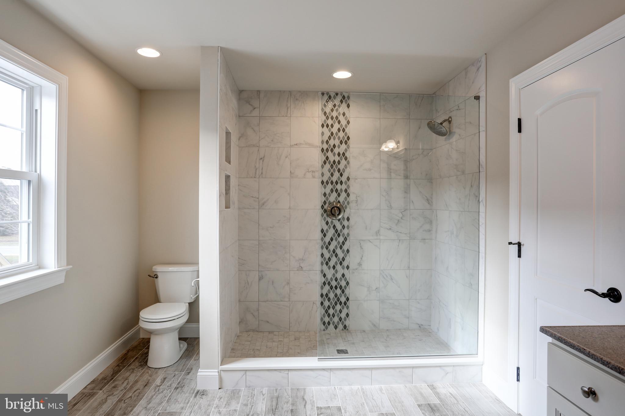 1021 Suffolk Drive, Unit 7 Lititz, PA 17543 - Photo 42 of 46 Decorative tile shower