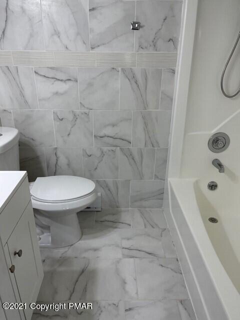 2115 Bushkill Circle Bushkill, PA 18324 - Photo 12 of 42 a bathroom with a toilet and a shower