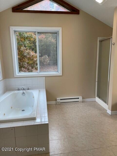 2115 Bushkill Circle Bushkill, PA 18324 - Photo 28 of 42 a bathroom with a bathtub and a shower