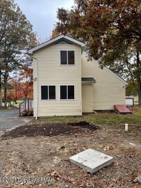 2115 Bushkill Circle Bushkill, PA 18324 - Photo 42 of 42 a front view of a house with a yard
