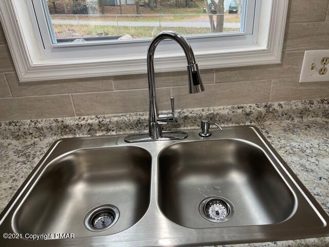2115 Bushkill Circle Bushkill, PA 18324 - Photo 9 of 42 a close view of sink and tap