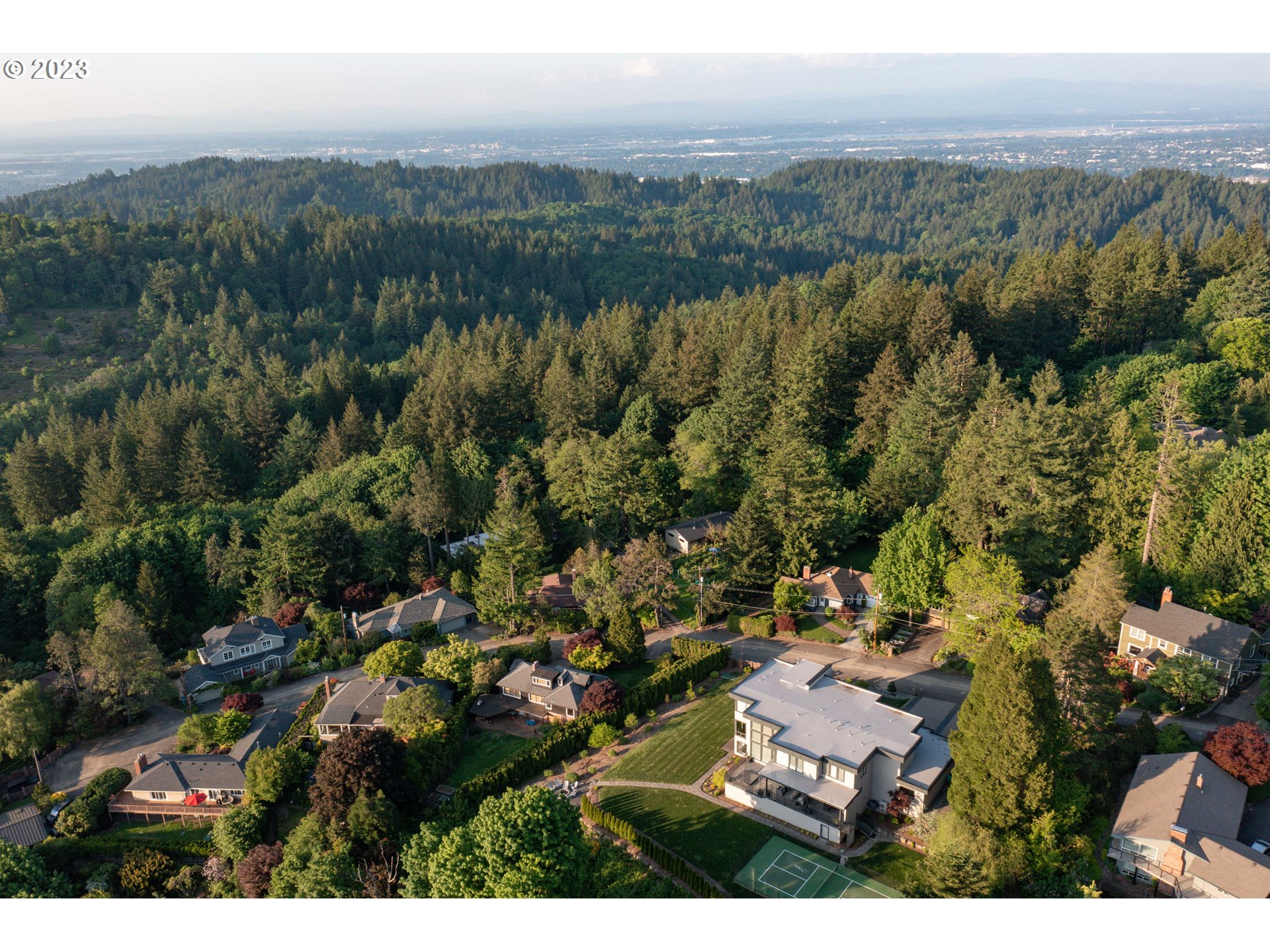 714 Northwest Skyline Crest Road Portland, OR 97229 - Photo 46 of 47 an aerial view of residential house with outdoor space and river