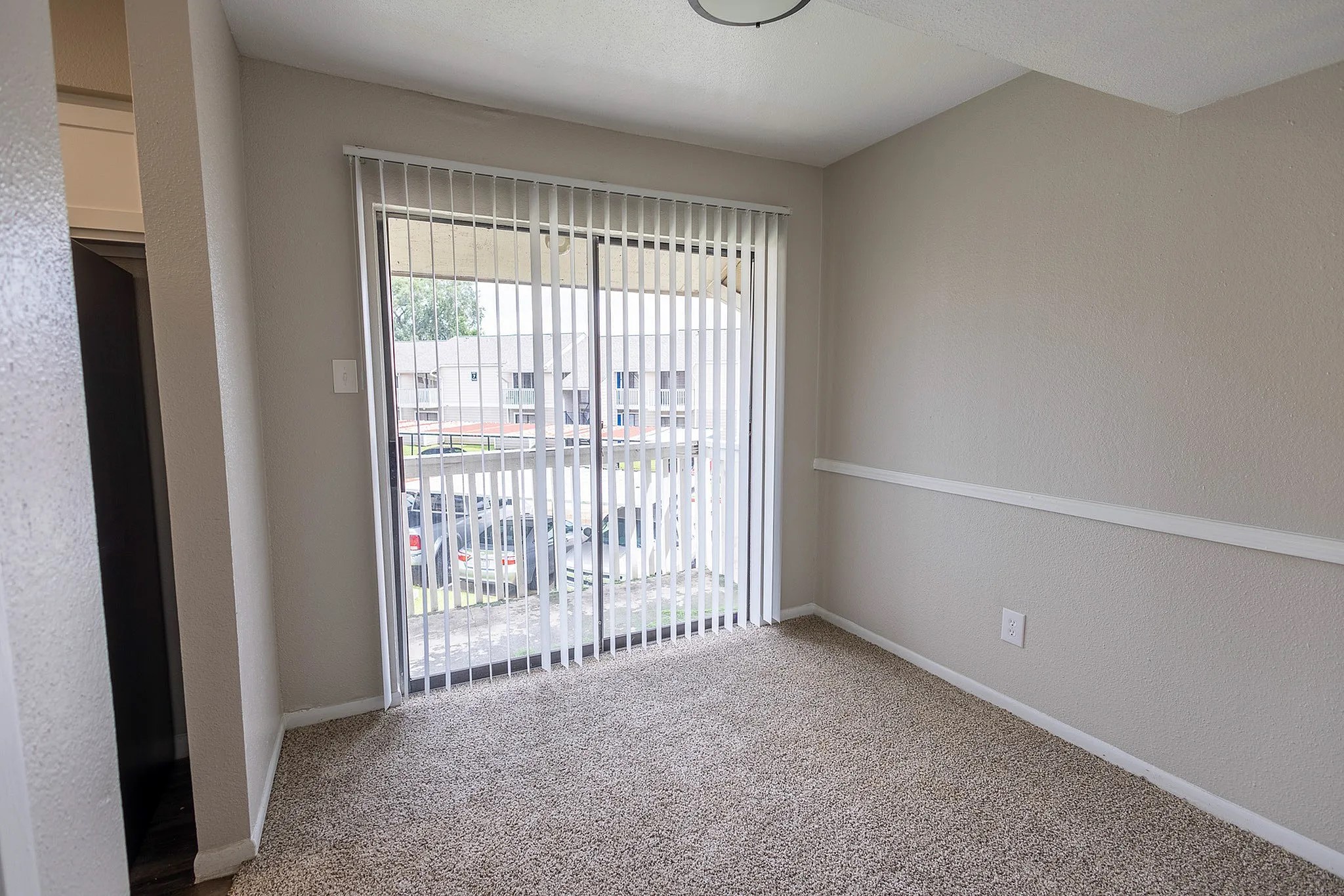 15100 Golden Eagle Drive, Unit 1305 Humble, TX 77396 - Photo 18 of 22 a view of an empty room with a window