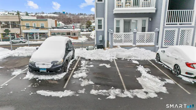 a view of a patio with a table and chairs