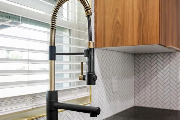 a view of balcony with wooden floor