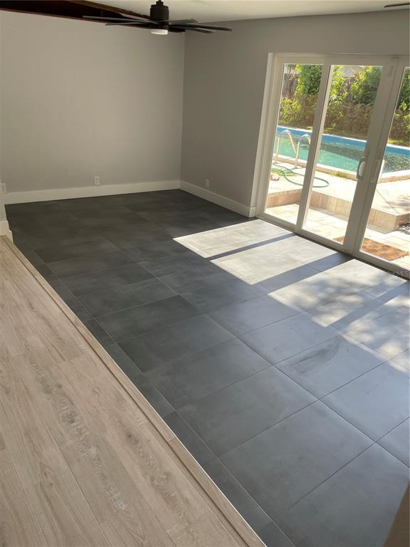 1407 Berwyn Road Orlando, FL 32806 - Photo 15 of 42 an empty room with windows