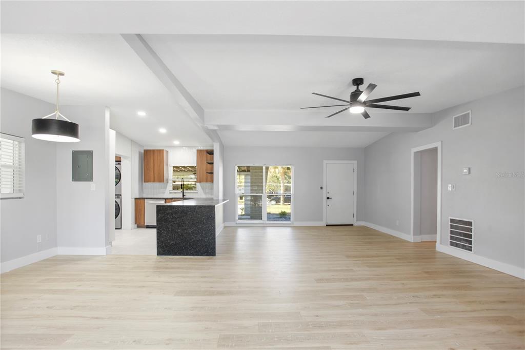 1407 Berwyn Road Orlando, FL 32806 - Photo 2 of 42 a view of a livingroom with kitchen appliances