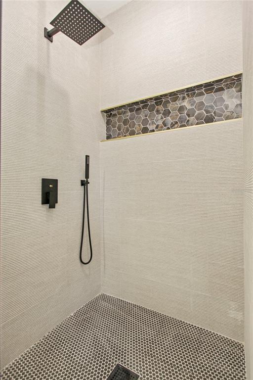 1407 Berwyn Road Orlando, FL 32806 - Photo 25 of 42 a bathroom with a shower
