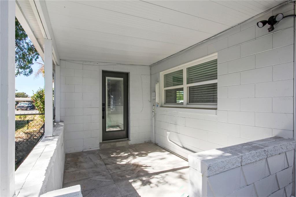 1407 Berwyn Road Orlando, FL 32806 - Photo 32 of 42 a view of a house with a backyard