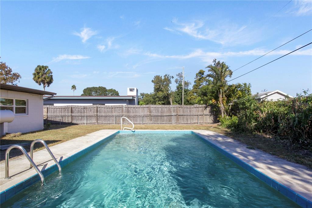 1407 Berwyn Road Orlando, FL 32806 - Photo 34 of 42 a view of a backyard with swimming pool
