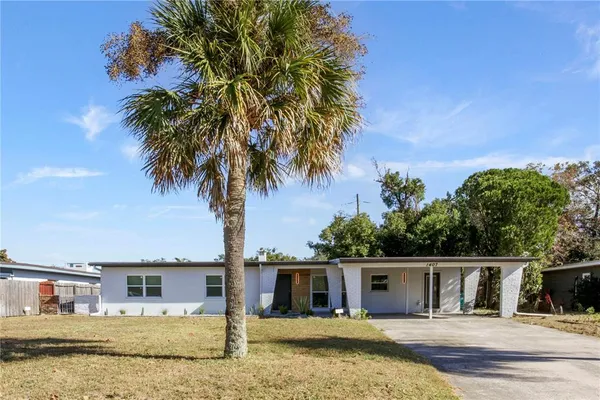 front view of house with a small yard