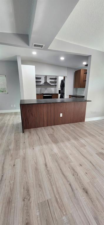 1407 Berwyn Road Orlando, FL 32806 - Photo 10 of 42 a view of hallway with wooden floor