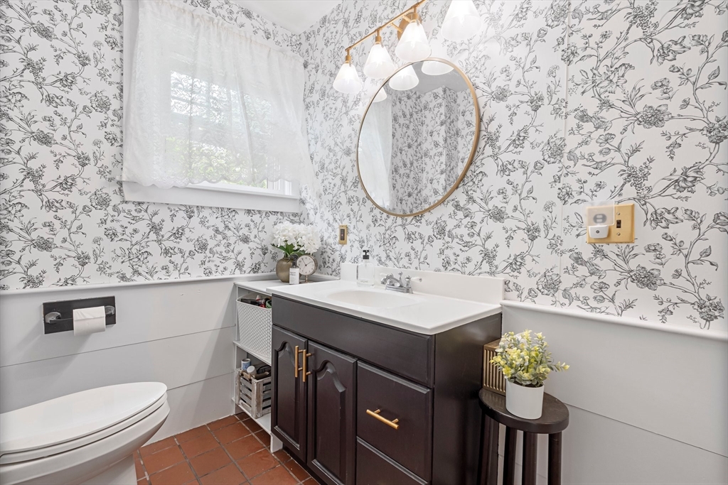 172 Union Street Weymouth, MA 02190 - Photo 21 of 40 a bathroom with a sink a vanity and a mirror