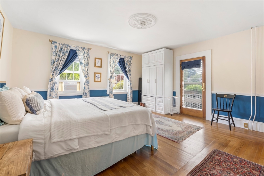 172 Union Street Weymouth, MA 02190 - Photo 22 of 40 a bedroom with a large bed and a window