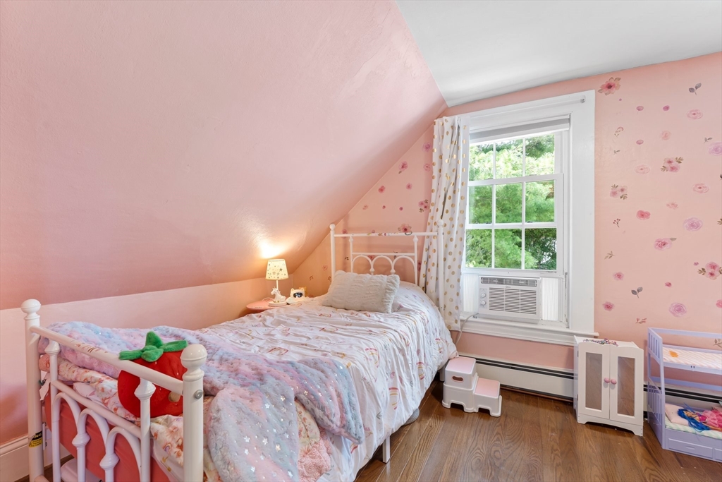 172 Union Street Weymouth, MA 02190 - Photo 27 of 40 a bedroom with a bed and a window