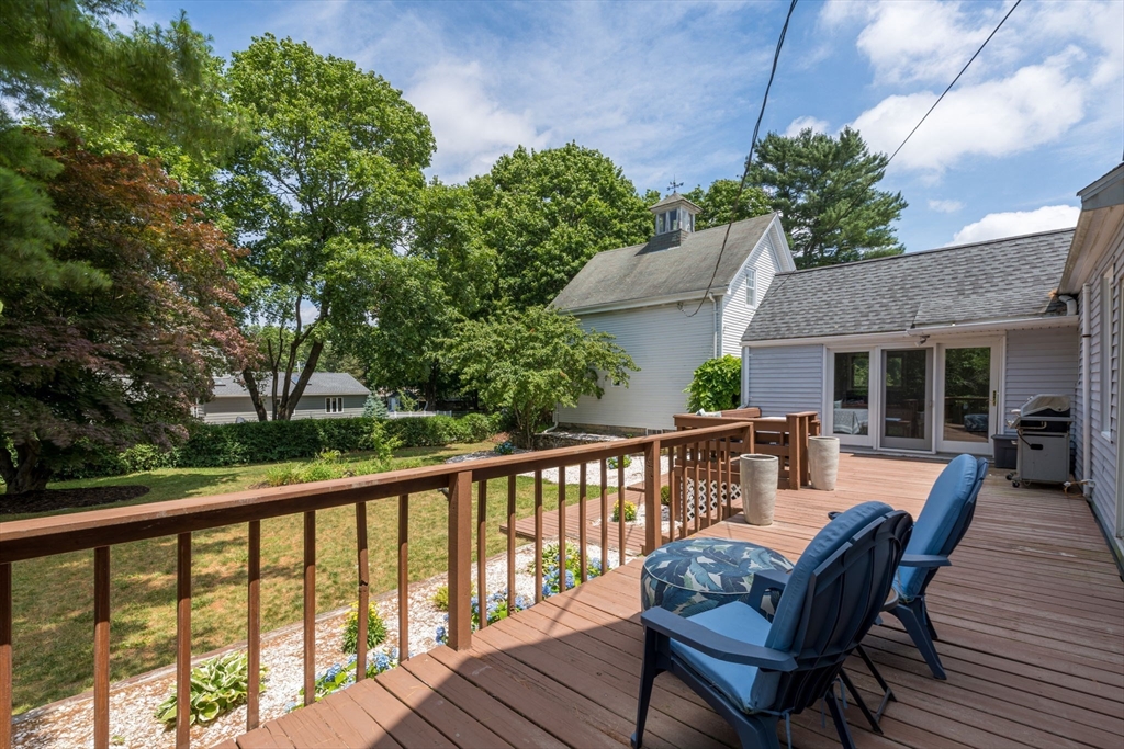 172 Union Street Weymouth, MA 02190 - Photo 31 of 40 a view of a chair and table on the deck