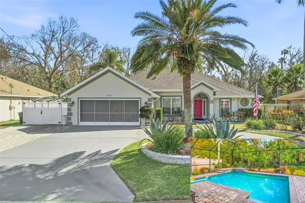a view of a house with a backyard porch and sitting area