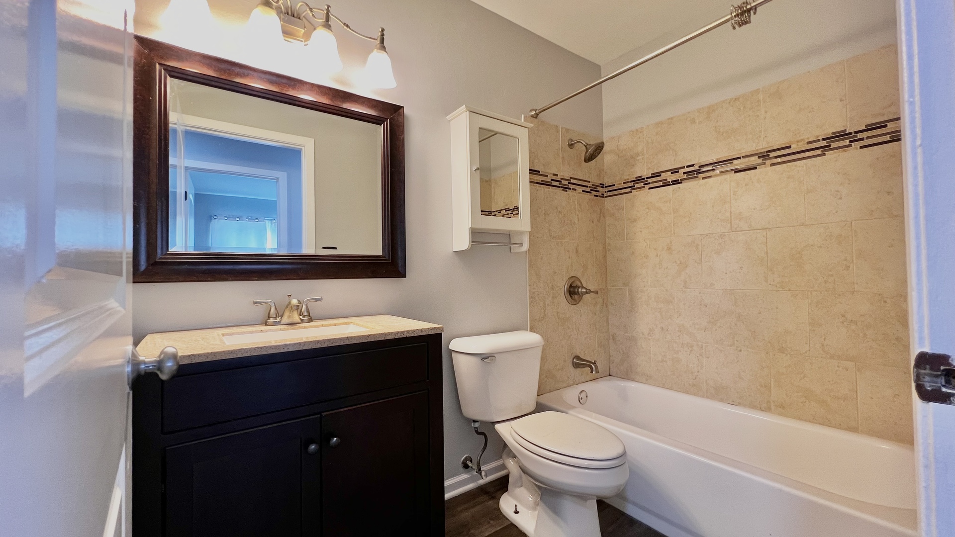 14 Timberlane Road Matteson, IL 60443 - Photo 10 of 15 a bathroom with a toilet a sink and a bathtub