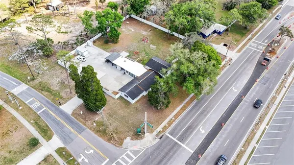 a view of a balcony with wooden floor