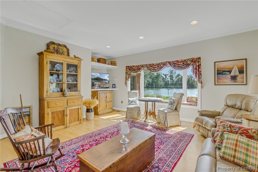 181 Duckbill Road White Stone, VA 22578 - Photo 40 of 50 Hardwood floored living room featuring ornamental molding
