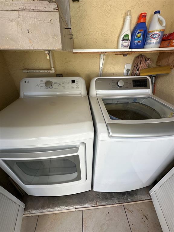 3846 59th Avenue West, Unit 3846 Bradenton, FL 34210 - Photo 18 of 25 a utility room with washer and dryer